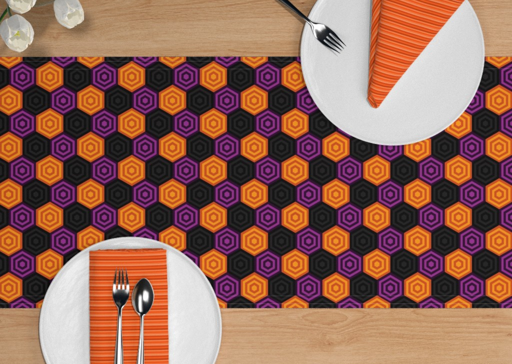 A table runner in my design Tri-Colored Nested Hexagons - Halloween and napkins in Orange Pinstripes
